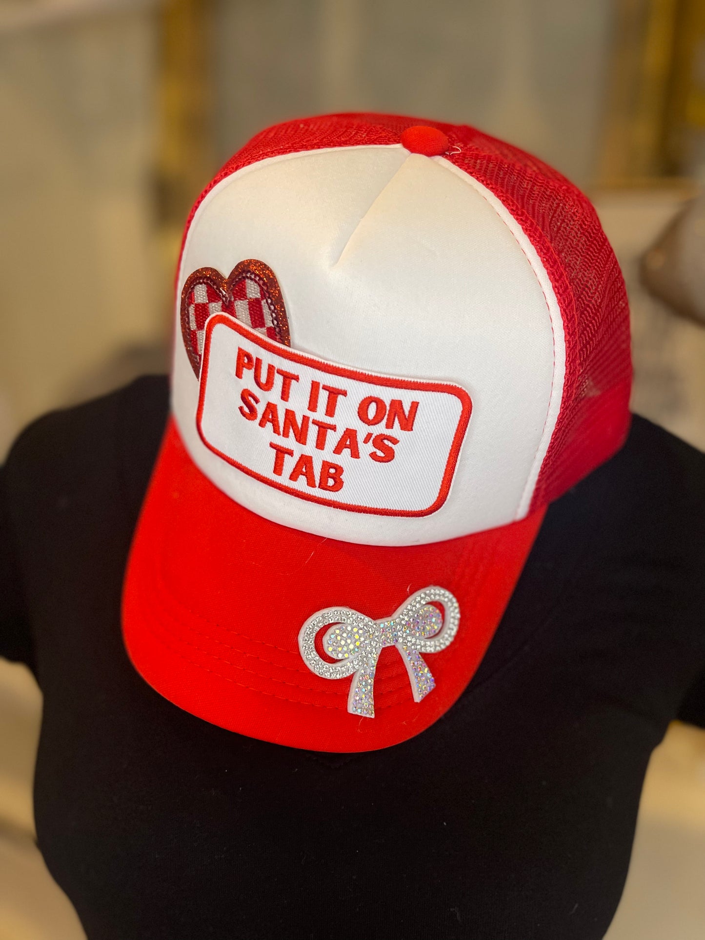 Christmas Put it on Santa’s Tab Trucker Hat