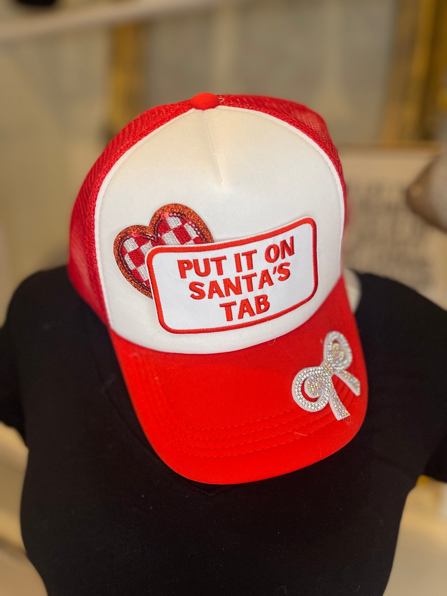 Christmas Put it on Santa’s Tab Trucker Hat